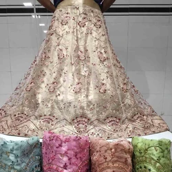 Delightful design embroidered Net Lehenga Choli heavy work