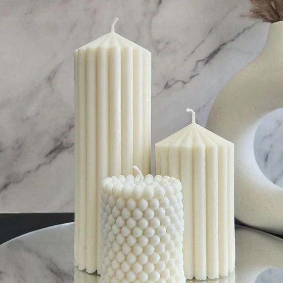 white-pillar-candles-2.webp