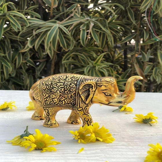 gold-elephant-statue-2.webp