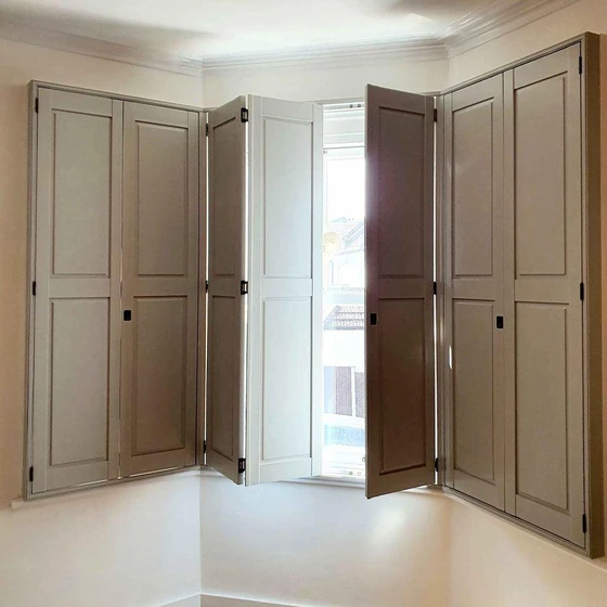 wooden-panel-window-shutters-2.webp