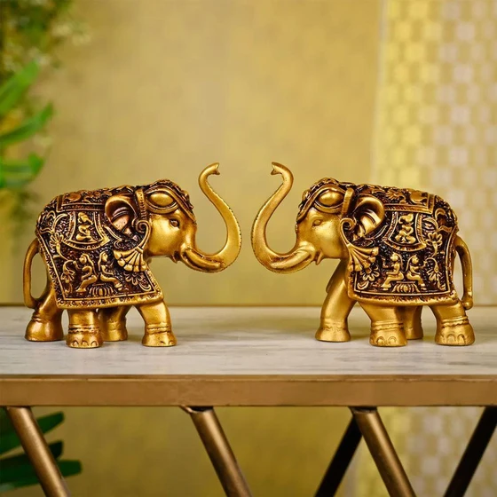 golden-elephant-statue-1.webp