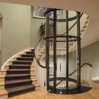 Capsule Shaftless Lifts, Transparent glass structure