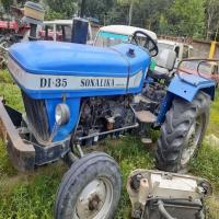 Farm Tractor Second Hand, Paddy field operations Image