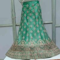Delightful design embroidered Net Lehenga Choli heavy work
