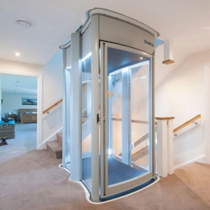 Capsule Shaftless Lifts, Transparent glass structure
